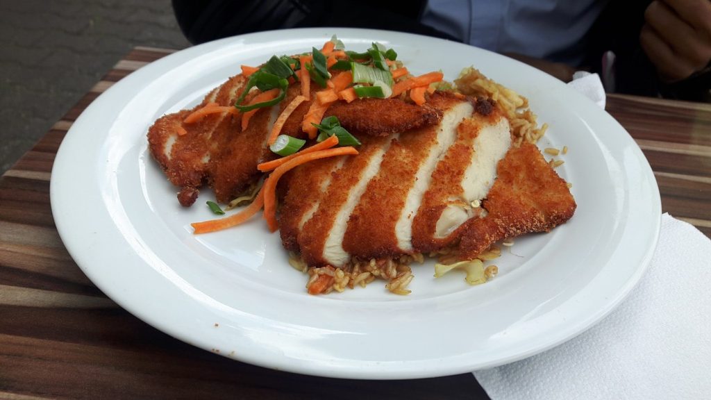 cooked food served on white plate