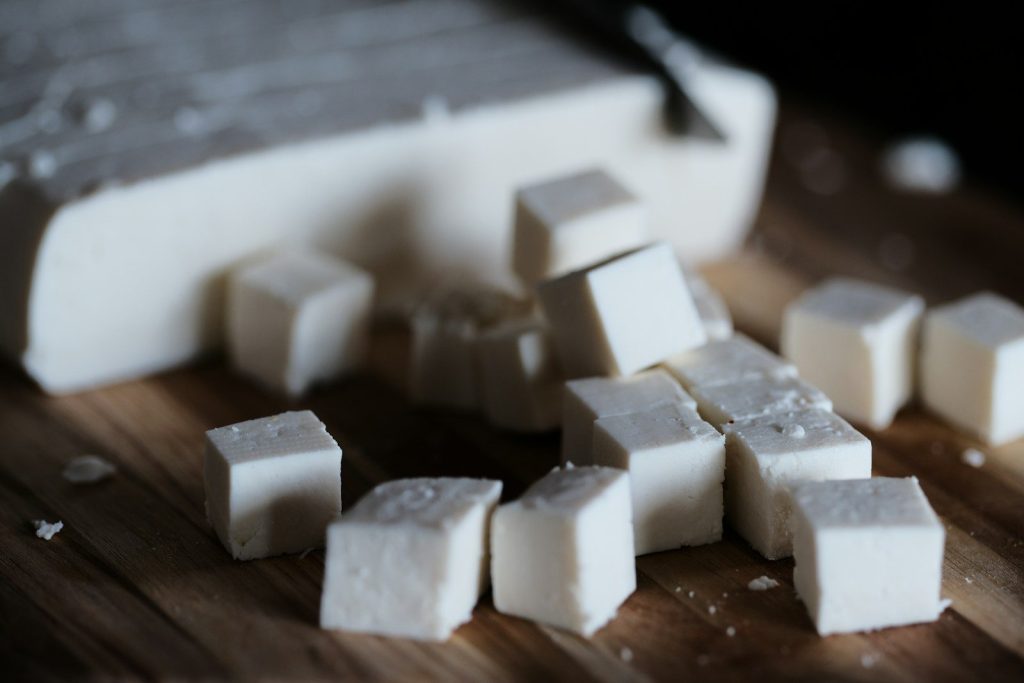 white and black square shape on brown wooden table