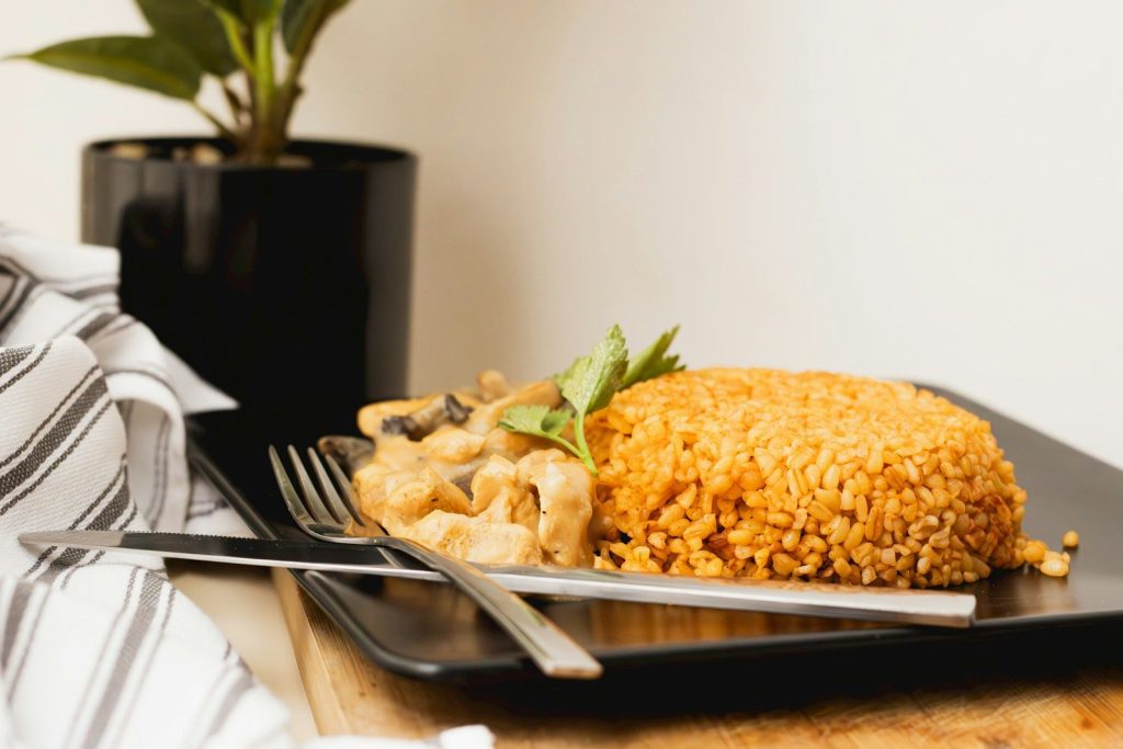 a plate of food on a wooden table