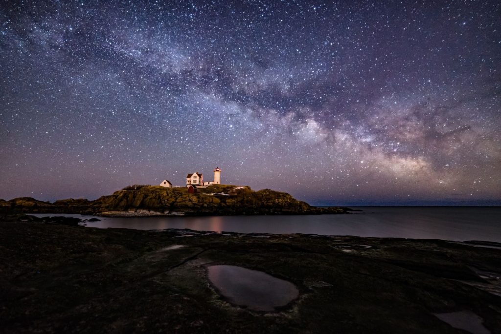 Captivating view of the Milky Way over Nubble Lighthouse in Maine.