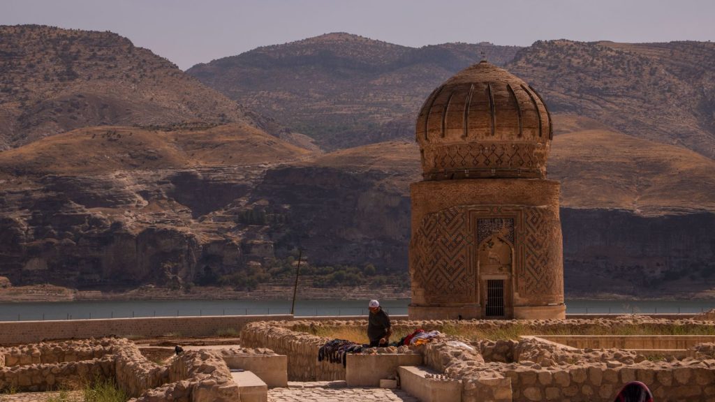Ancient Zeynel Bey Tomb amidst the scenic landscape of Hasankeyf, Turkey.