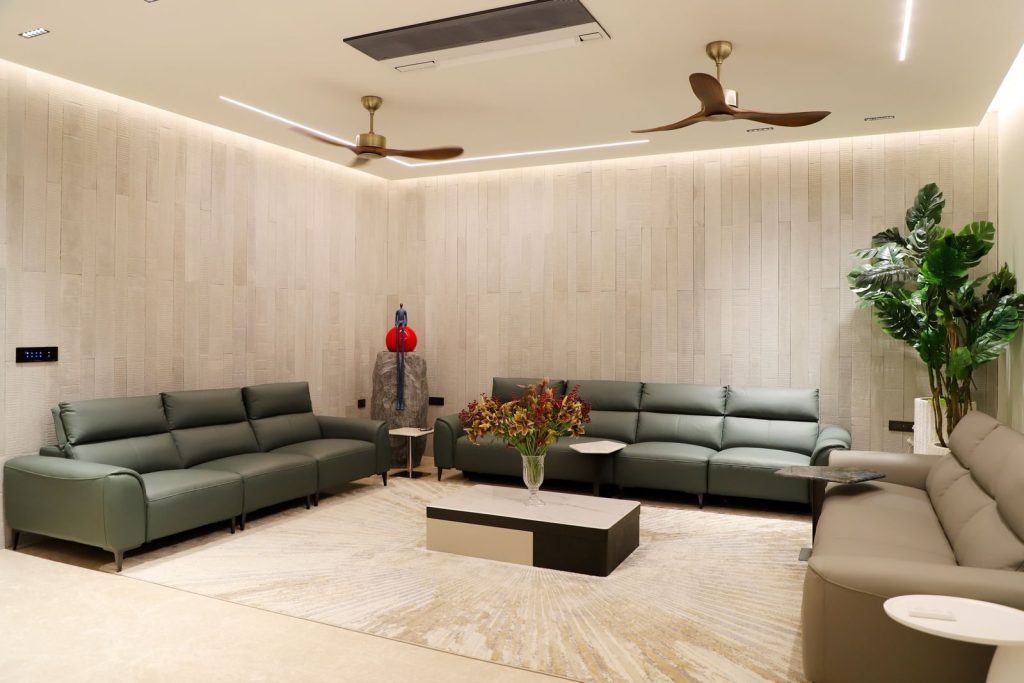 Stylish and modern minimalist living room with green sofas and elegant decor, perfect for interior design inspiration.