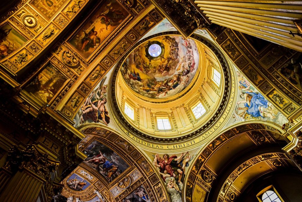 Captivating view of the intricate frescoes inside St. Peter's Basilica in Vatican City, Italy.