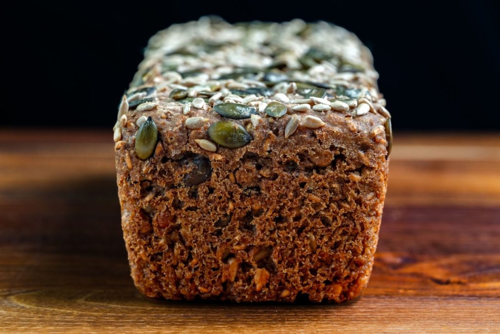 Delicious artisan multigrain loaf topped with pumpkin and sunflower seeds.