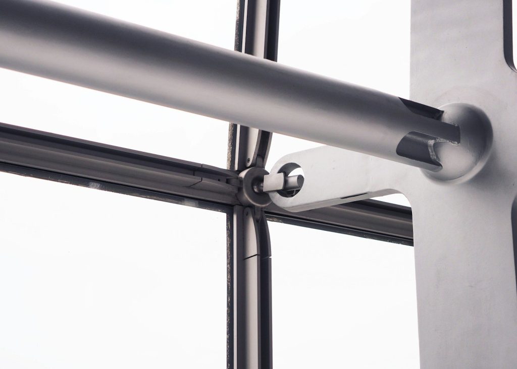 A close up of a metal bar on a wall