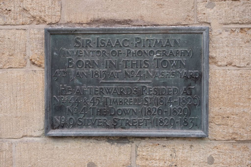 Bronze plaque commemorating Sir Isaac Pitman's birthplace and residences in the town.