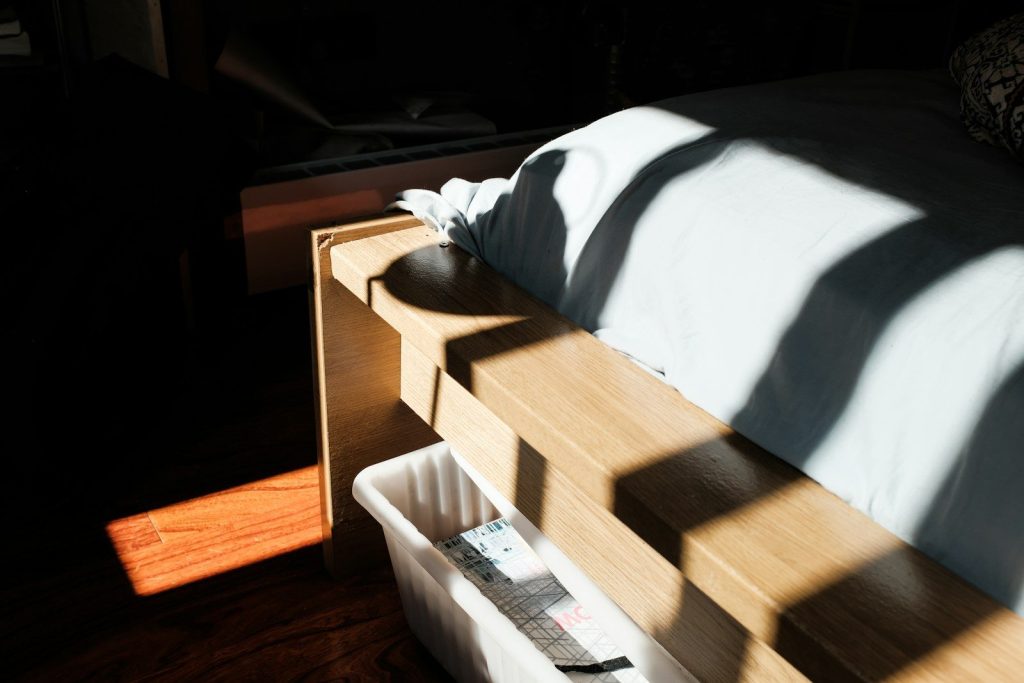 white textile on brown wooden table