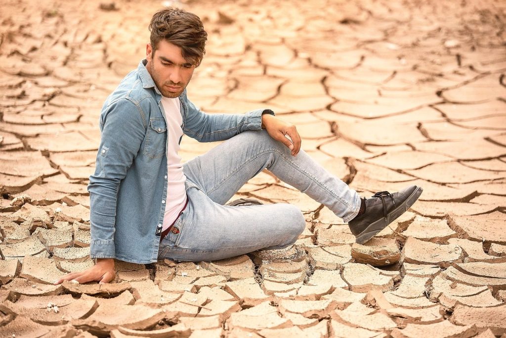 man, model, portrait, arid, erosion, dried land, denim, denim jacket, denim jeans, male, guy, male model, modeling, pose, posing, fashion, style, outfit