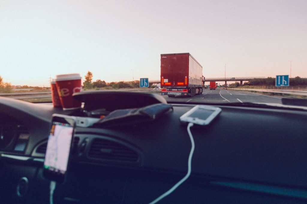 Experience the open road with a scenic drive, capturing the essence of freedom through the car windshield.