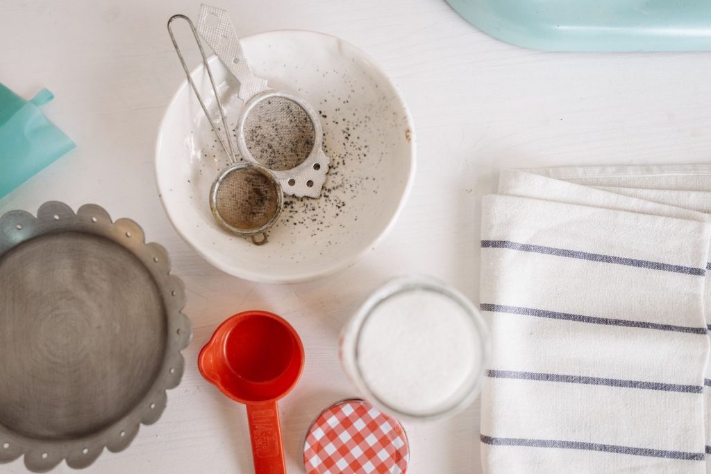 Overhead view of baking tools and ingredients, perfect for kitchen and recipe visuals.