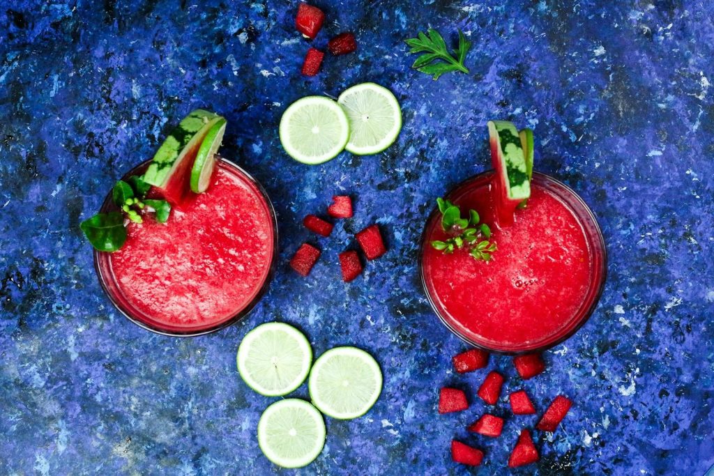 Refreshing watermelon cocktails with lime and mint, perfect for summer vibes.