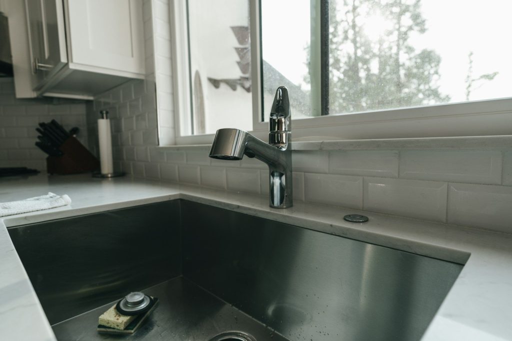 a kitchen sink with a window