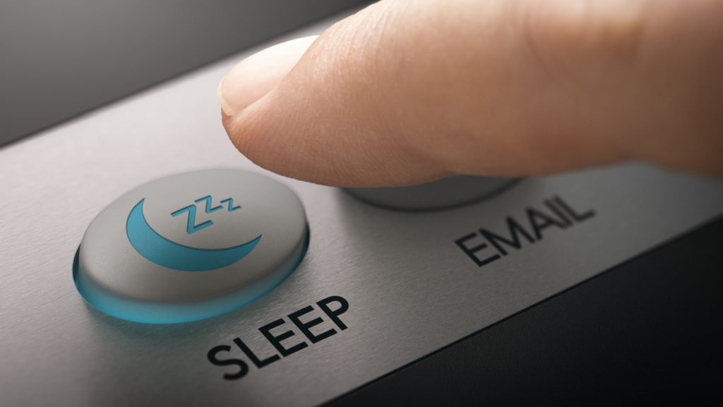 'Finger pressing a sleep mode button. Composite image between a hand photography and a 3D background.