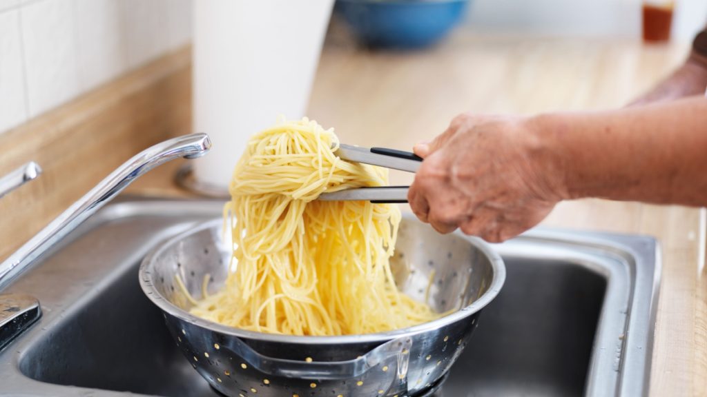 pile of fresh pasta in strainer