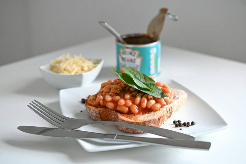 a plate of food and a cup of coffee