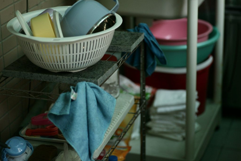 blue towel on stainless steel rack