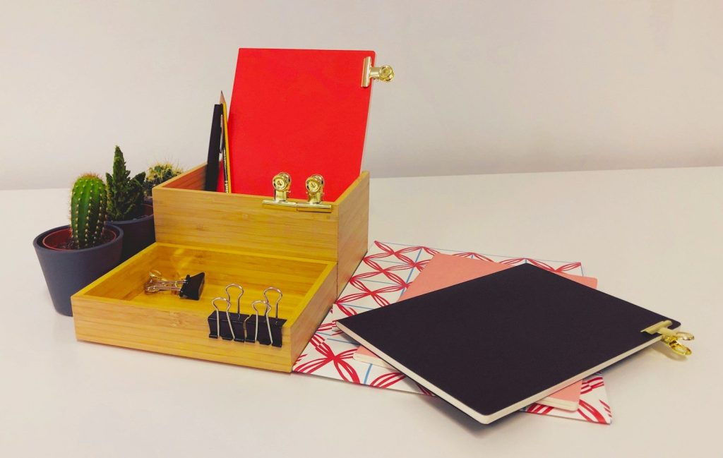 red and gold box on white table