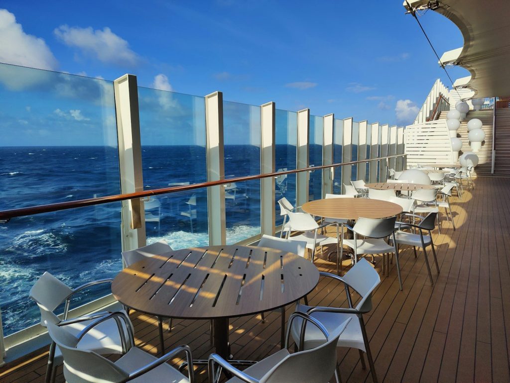 tables and chairs on a deck