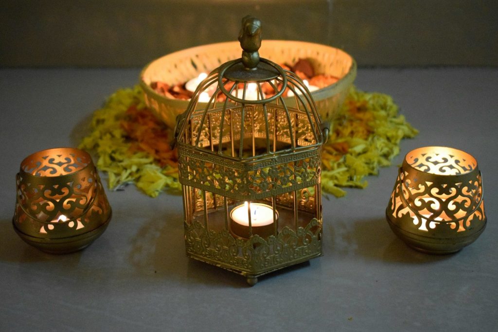 brown and black floral candle lantern