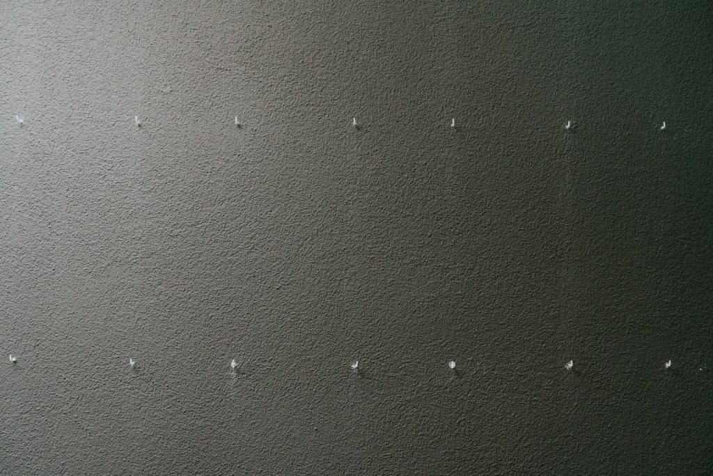 a black and white photo of a wall