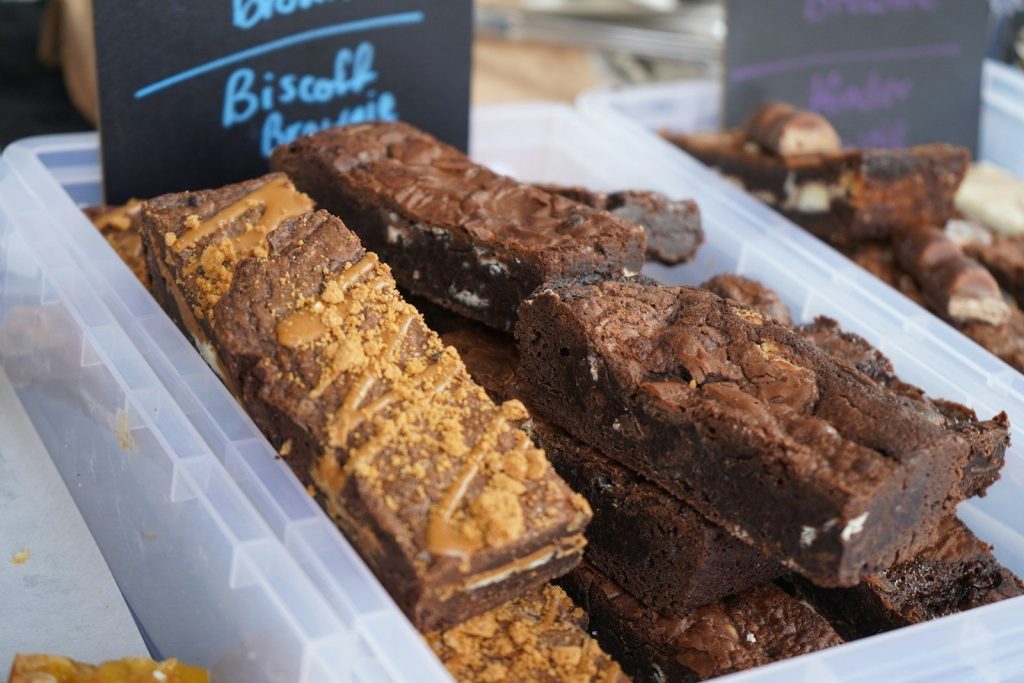 Brownies, including a biscoff brownie, are shown.