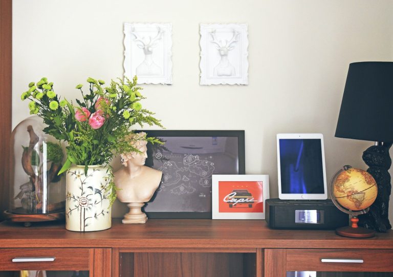 gray flat screen tv on brown wooden tv rack