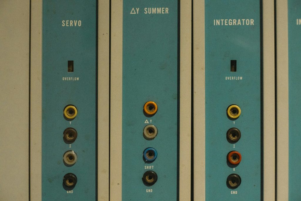 A row of blue and white electrical switches