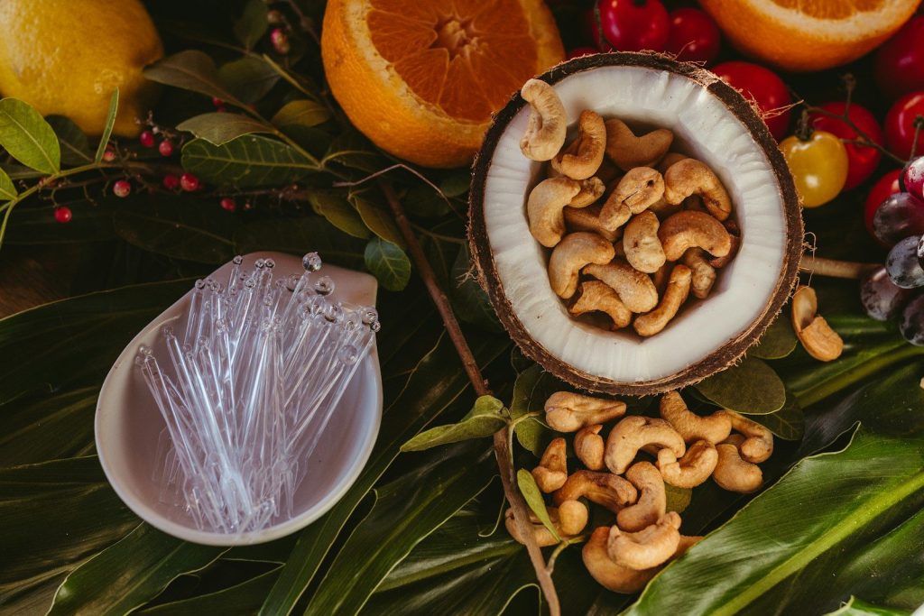 A bunch of fruits and nuts on a table