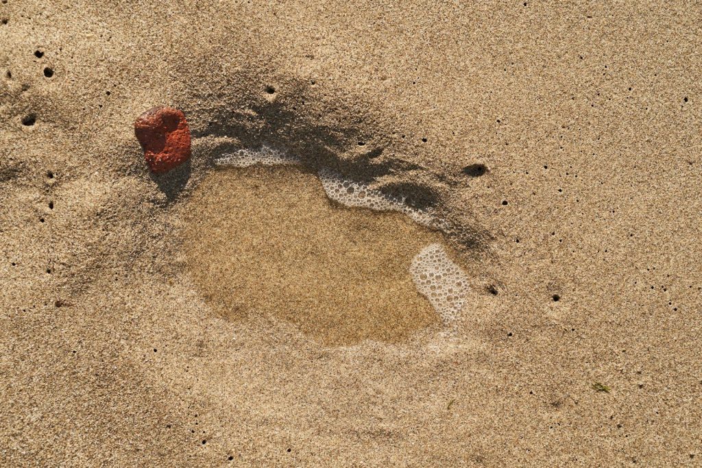 a heart drawn in the sand