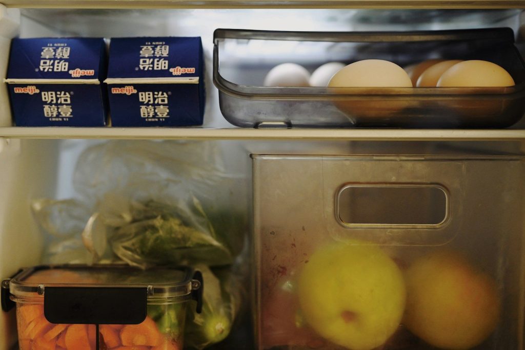 an open refrigerator filled with lots of food