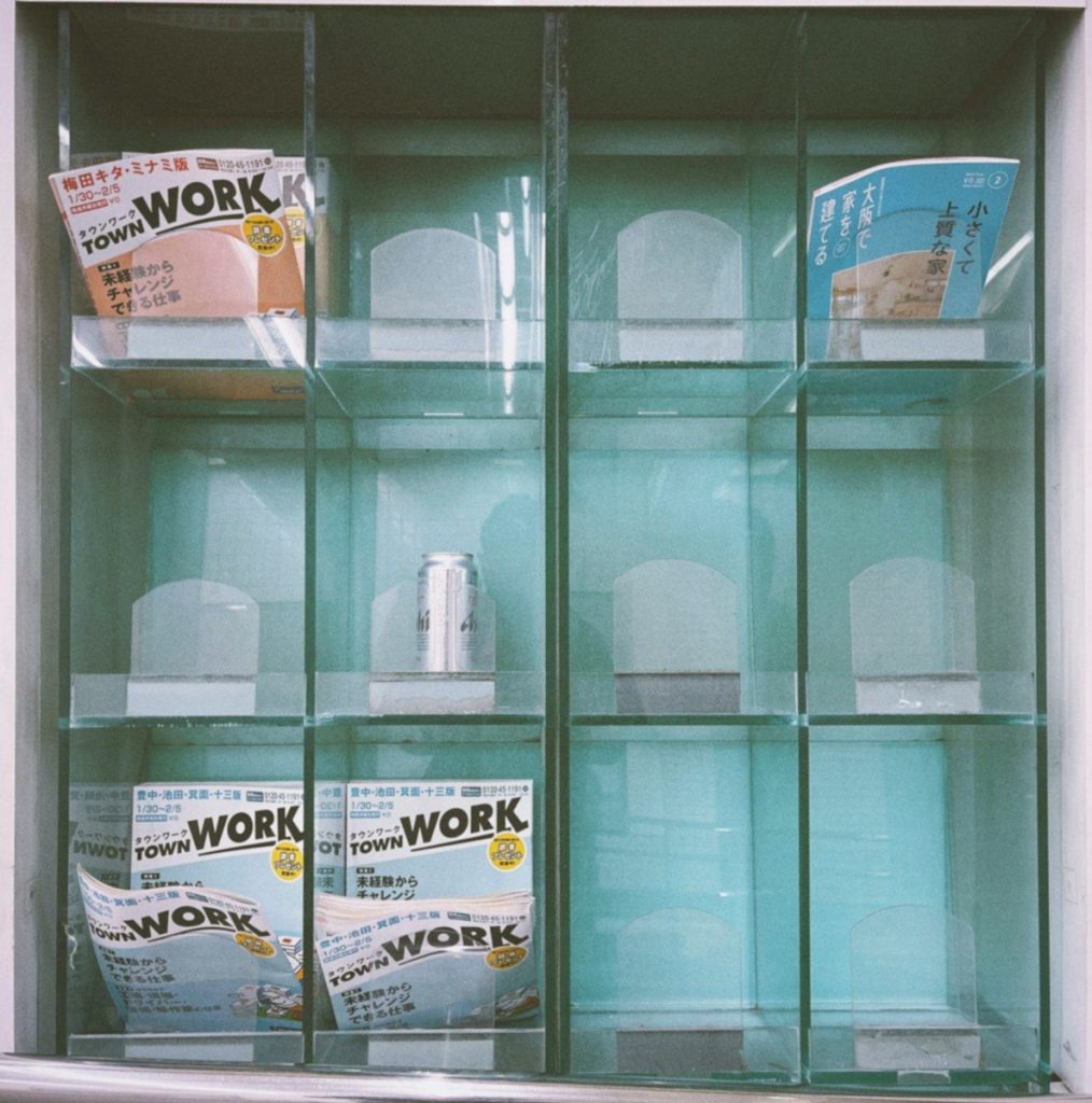 a display case filled with lots of bottles of work