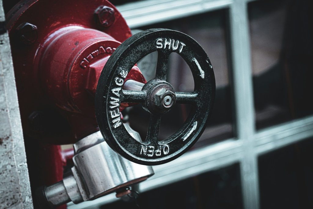 black and red metal steering wheel