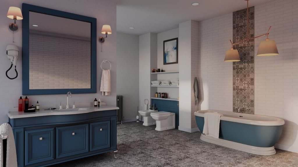 A modern bathroom with a blue vanity and bathtub.