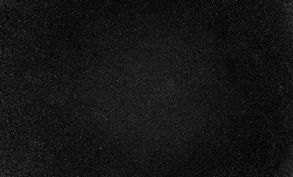 black textile on black background
