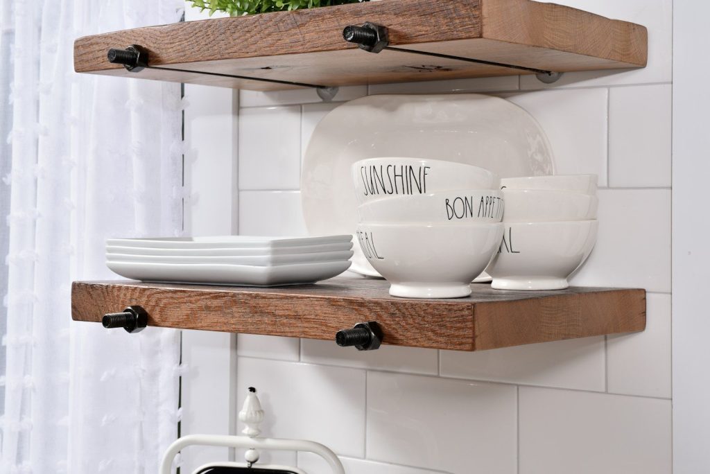 white dishware set on wooden wall shelf