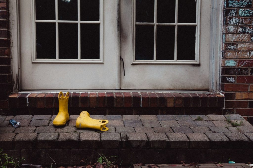 a couple of bananas on a sidewalk