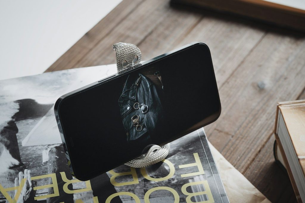a cell phone sitting on top of a book