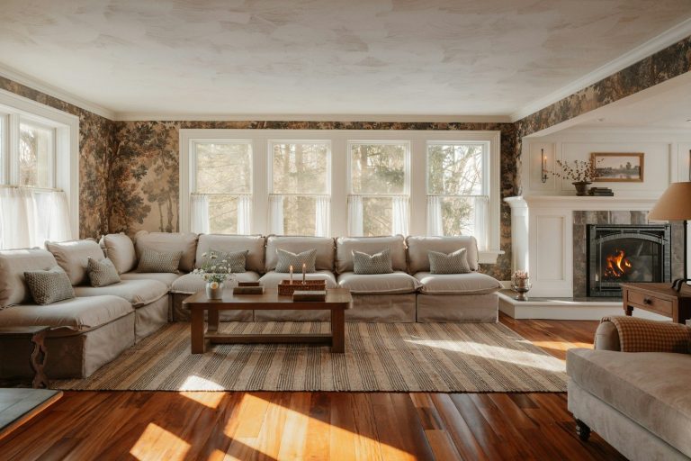 Cozy living room with sectional sofa and fireplace.