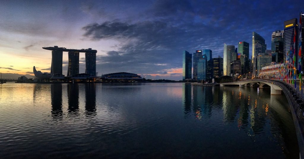a large body of water surrounded by tall buildings