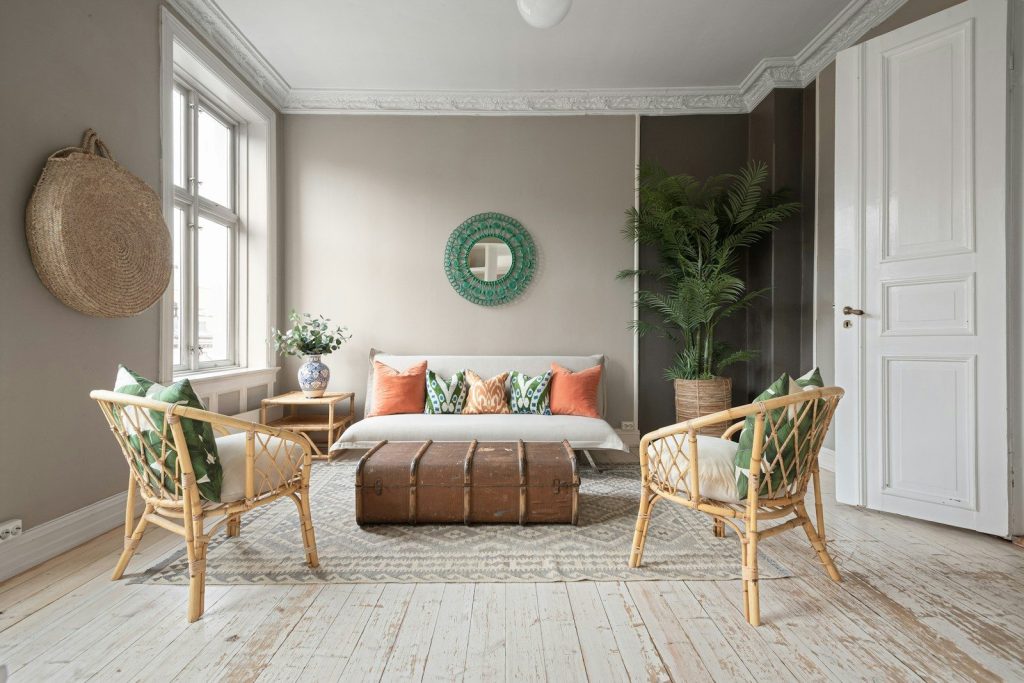 A living room filled with furniture and a large window