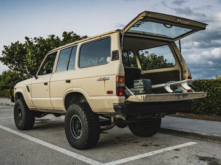 white and brown jeep wrangler on road during daytime