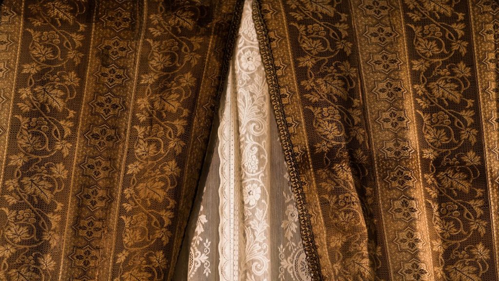 brown and black floral window curtain