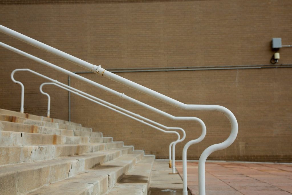 white and brown concrete staircase