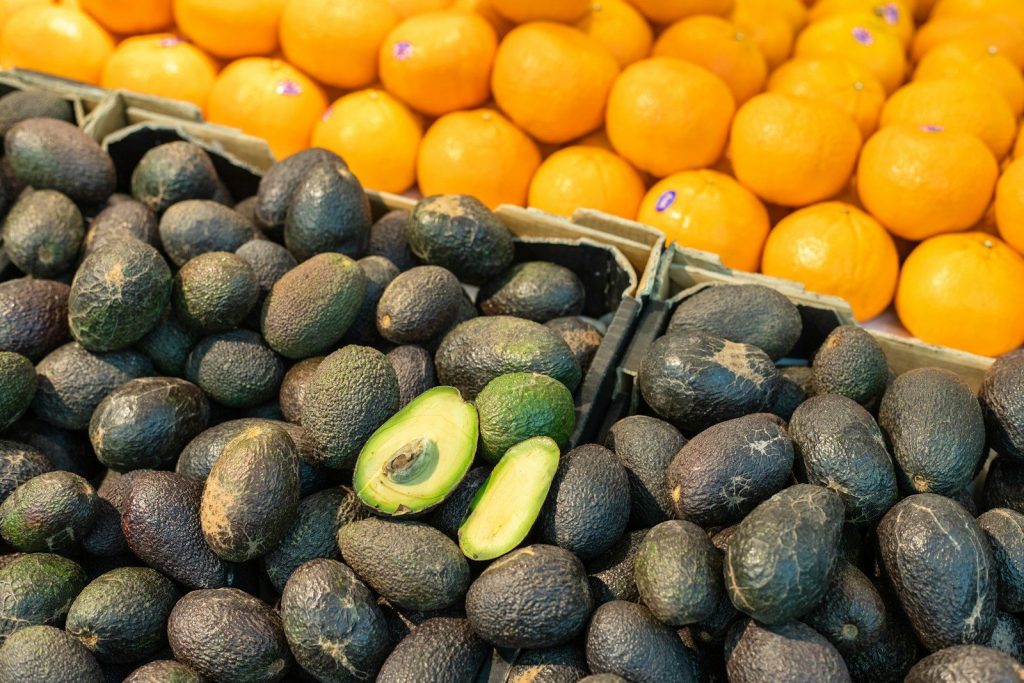 orange fruits on stainless steel rack