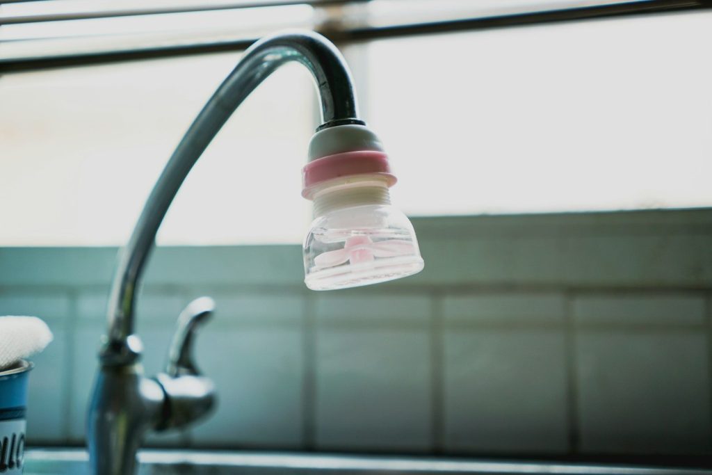 water filter attached on a faucet