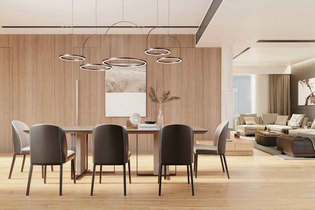 Modern dining room with wooden walls and contemporary furniture.