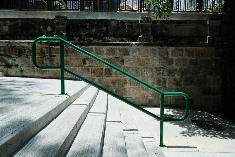 a green metal railing
