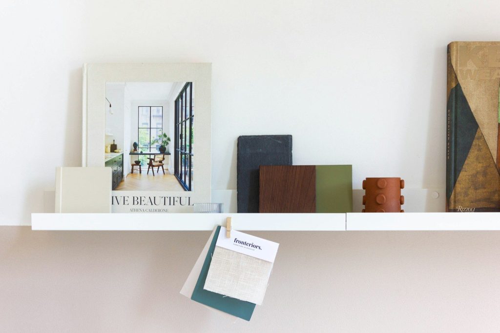 Decorated shelf with books and samples