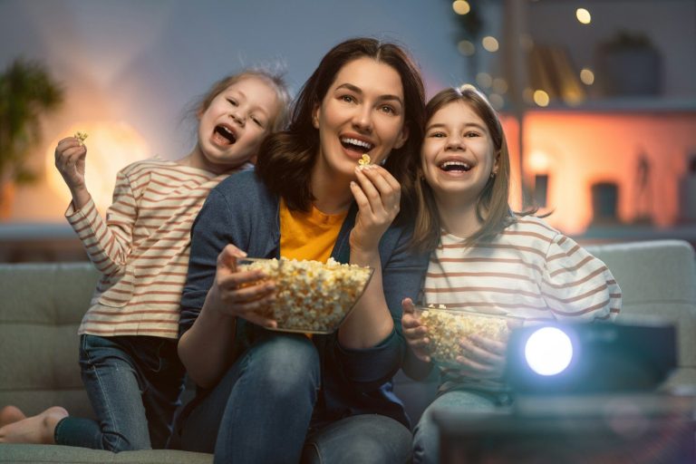 a group of women eating pizza